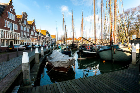 Hoorn, The Netherlands - December 11, 2009: Yachts are moored near the pier in small town Hoorn, The Netherlands.のeditorial素材