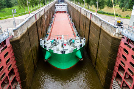 Vytegra, Russia - August 16, 2015: Close up image of cargo ship entered the White Sea-Baltic Canal Gateway.のeditorial素材