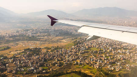 Aerial view for Kathmandu from the airplane porthole, the plane is landing. Travel conceptの写真素材