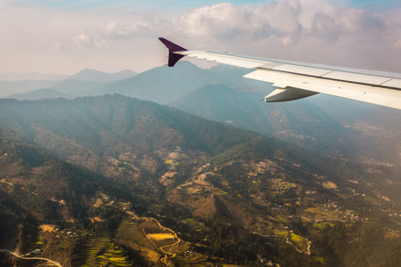 Aerial view for small Nepal villages from the airplane porthole, the plane is landing. Travel conceptの写真素材