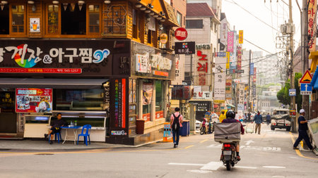 Seoul, South Korea - June 16, 2017: People walking down a small street in Seoul downtown.のeditorial素材