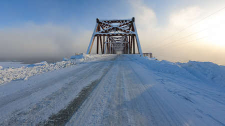 Automobile bridge over the Kolyma river, Kolyma, Yakutia, Russiaの写真素材