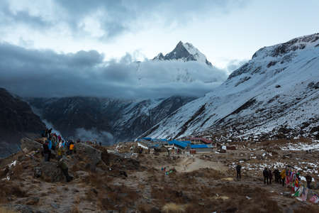Annapurna region, Nepal - November 10, 2018: Hikers in the Annapurna Base Camp, Annapurna Conservation Area, Himalaya, Nepalのeditorial素材