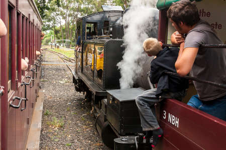 Melbourne, Australia - January 7, 2009: Puffing Billy steam train with passengers. Historical narrow railway in the Dandenong Ranges near Melbourne.のeditorial素材