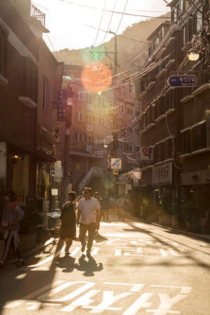 Seoul, South Korea - June 10, 2017: People walking down a small street near Changdeokgung Palace in Seoul.のeditorial素材