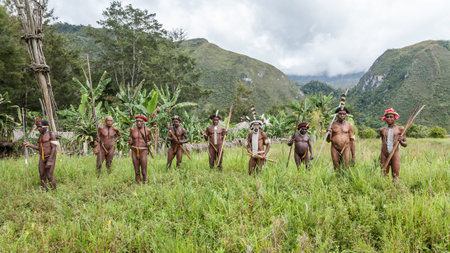 Wamena, Indonesia - January 9, 2010: Men of the Dani tribe in a traditional dress in the Dugum Dani...