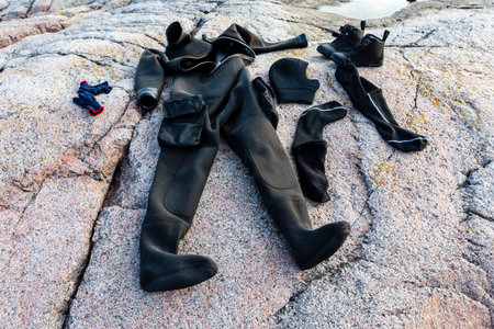 Diving equipment dries after diving on the stone seashore