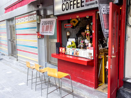 Seoul, South Korea - June 3, 2017: Seller waiting the customers in funny espresso bar on street in Korea.のeditorial素材