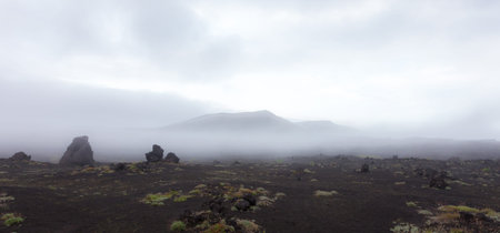 Foggy volcanic landscape near Volcano Tolbachik in the overcast weather. Kamchatka Peninsula, Russiaの写真素材