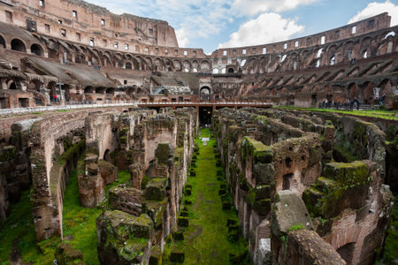 Rome, Italy - February 24, 2010: Tourists walking among the ruins of the Roman Colosseumのeditorial素材