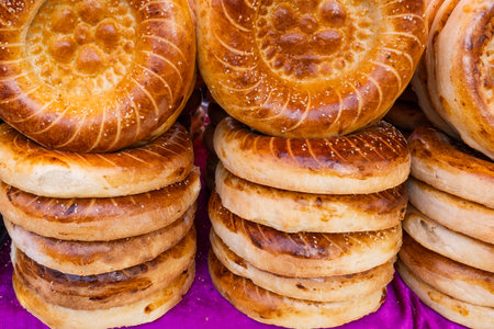 Tandoor naan or tandoor bread sold at the market in Kyrgyzstan. Traditional asian food