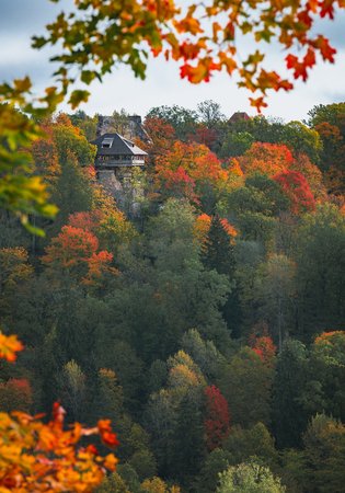 Picturesque view on valley of Gaujas national park. Trees changing colors in foothills.  Colorful Autumn day at city Sigulda in Latvia.のeditorial素材