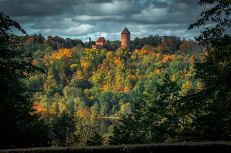 Picturesque view on valley of Gaujas national park. Trees changing colors in foothills.  Colorful Autumn day at city Sigulda in Latvia.のeditorial素材