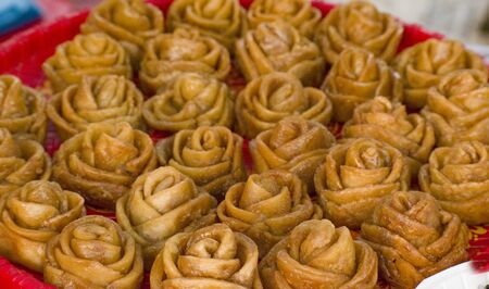 Pitha is a type of rice cake common in Bangladesh, Nepal and India, especially the eastern states of Assam, Bihar, Jharkhand, Kerala, Odisha, West Bengal and the northeastern region of India.の写真素材