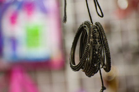 A bracelet is an article of jewellery that is worn around the wrist. Bracelets may serve different...