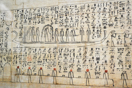 Cairo, Egypt - 19th May, 2018: Egyptian hieroglyphs symbols and signs on a papysus. Exhibiting the...
