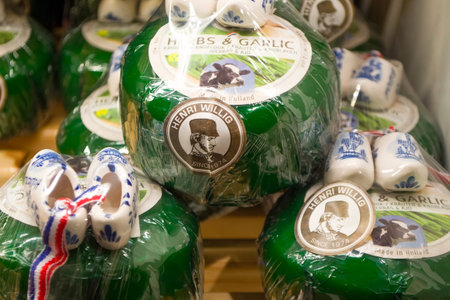 Zaanse Schans, Netherlands - 5th June, 2019: Holland Henry Willig cheese in a shop window beautifully packaged with small ceramic klumps.Traditional souvenir from Holland.Close view,selective focuse.のeditorial素材