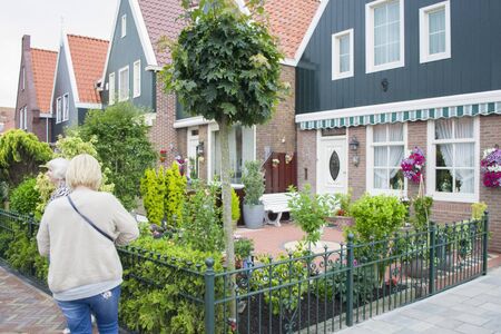 Volendam, Netherlands - 5th June, 2019: Views of the famous Dutch province - a medieval fishing town - Volendam. Now - a residential village and a famous tourist attraction.Dutch village architecture.のeditorial素材