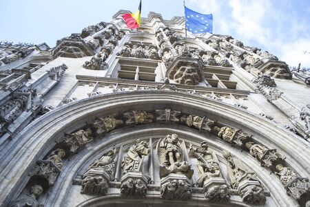 Brussels, Belgium - 6th June, 2019: The Town Hall or Hotel de Ville is the central edifice on the Grand Place - important tourist sites. Arched passage to the patio. A vivid example of Brabant Gothic.のeditorial素材