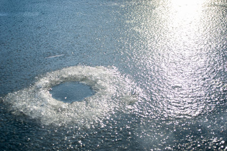 Winter landscape on the river, fishing holeの写真素材