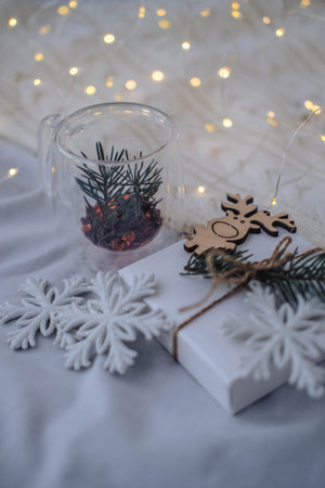Christmas or New Year decoration with snowflakes in a glass cupの写真素材