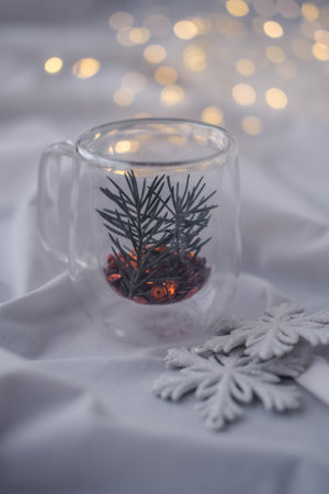 Christmas and New Year Decorations in a glass on a white backgroundの写真素材