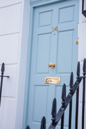Entrance door to a residential house in London. London is the capital and most populous city of...