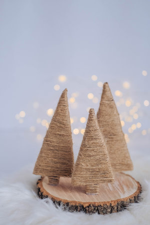 Christmas tree on white background with bokeh. Christmas and New Year concept.の写真素材