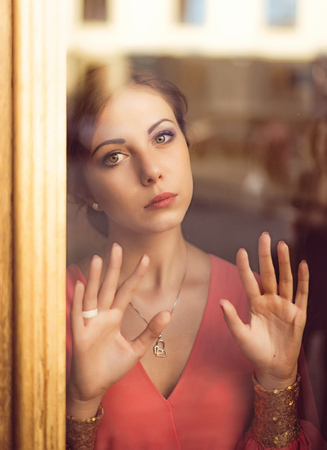 Expectation. Gentle sweet girl with piercing eyesの写真素材