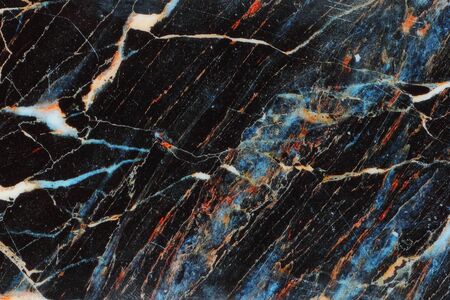 A Black blue orange patterned marble backgroundの写真素材