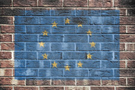 European Union flag on brick wall backgroundの写真素材