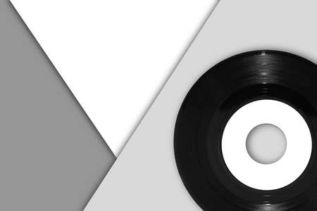 45rpm vinyl single record on monochrome triangle backgroundの写真素材
