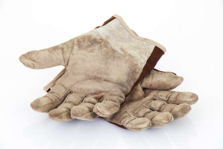 Leather work gloves on white a backgroundの写真素材