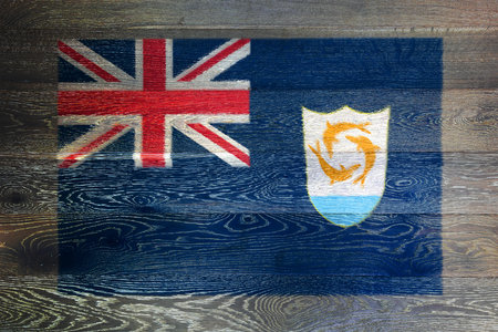 Anguilla flag on rustic old wood surface backgroundの写真素材