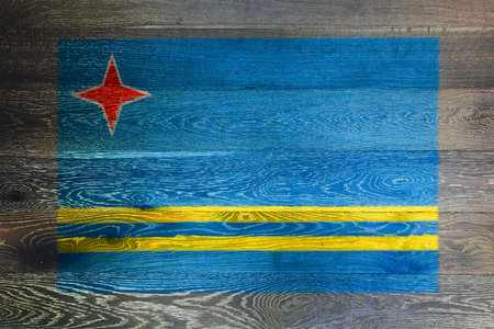 Aruba flag on rustic old wood surface backgroundの写真素材
