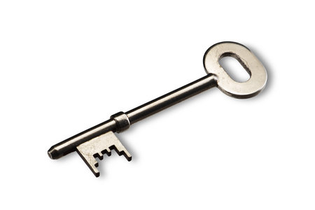 Old silver key on whiteの写真素材