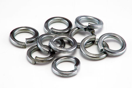 Large split spring washers on white background