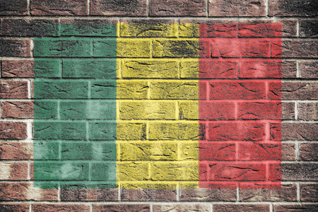 Mali flag on old brick wall backgroundの写真素材