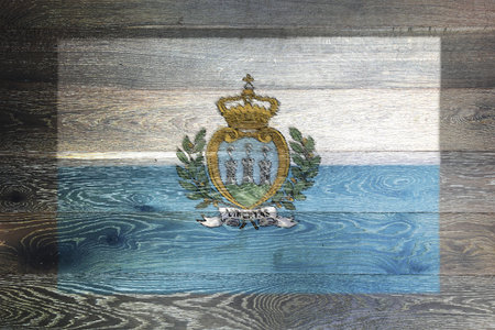 San Marino flag on rustic old wood surface backgroundの写真素材