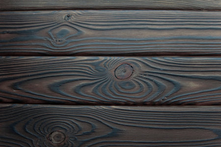 background of a dark wooden surface