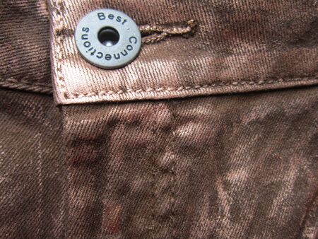 Denim with a metal button.の写真素材