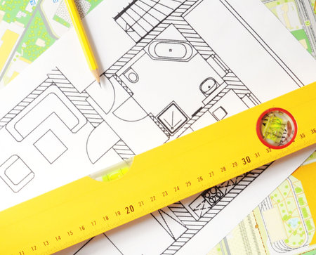 a modern building design with construction tools