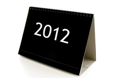 calendar shows Happy New Year 2012 on white background