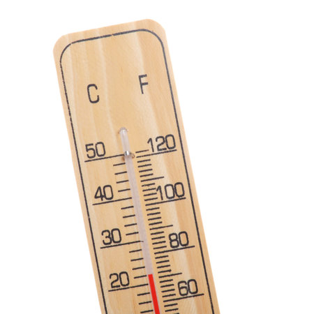 wooden thermometer with red scale on white background