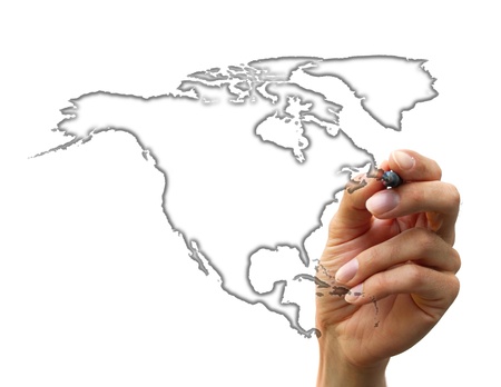 businessman drawing a map isolated on a white backgroundの写真素材