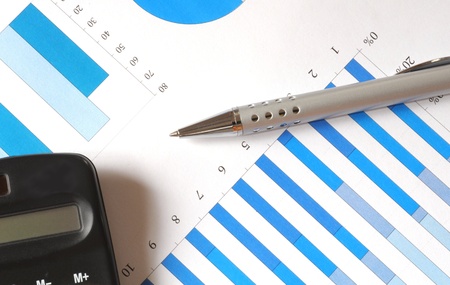 business chart of earnings trends with office equipmentの写真素材