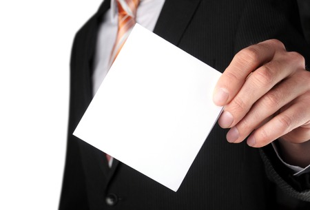 business man showing blank business card or signの写真素材