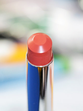 Closeup macro view of orange-brown bullet lipstickの写真素材