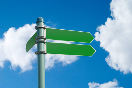 Customizable green street sign on a blue cloudy sky 