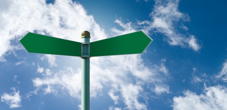 Customizable green street sign on a blue cloudy skyの写真素材